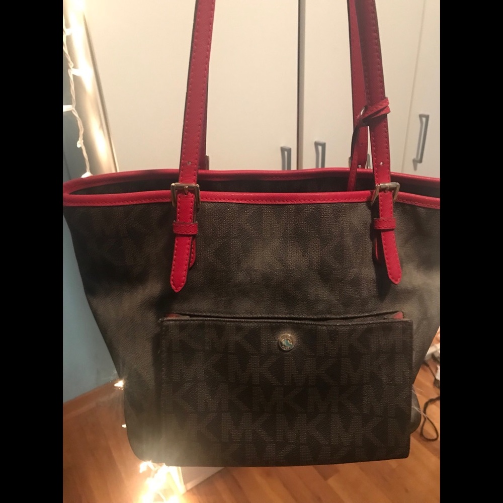 Michael Kors jet set with red trim purse